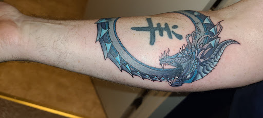 Explore one piece tattoo idea, creative tattoo ideas in Meadville, available at Lucky Lucys Tattoo and Art Studio