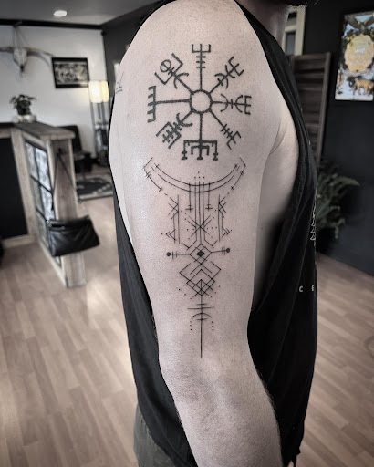 Explore floral hand tattoo ideas, creative tattoo ideas in Lincoln City, available at Xeper Studio Tattoos and Temple of Personal Development