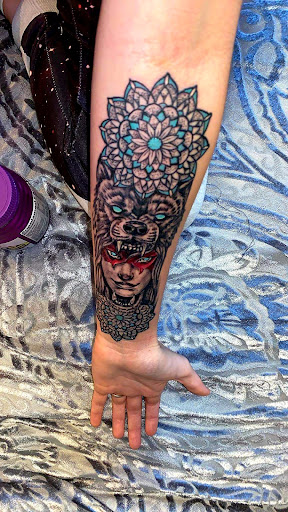 Explore hunting sleeve tattoo ideas, creative tattoo ideas in Conway, available at Primal Urge Tattoos