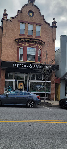 Explore american flag forearm tattoo ideas, creative tattoo ideas in Royersford, available at Kingfisher Collective Tattooing & Piercing