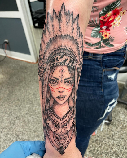 Explore tractor tattoos ideas, creative tattoo ideas in Sanford, available at Luv Ink