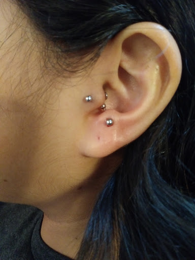 Explore fine line hand tattoo ideas, creative tattoo ideas in Enid, available at AppleAlleyPiercing