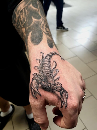 Explore easy tattoo cover up ideas, creative tattoo ideas in Sarasota, available at SEVEN SINS Tattoo Studio