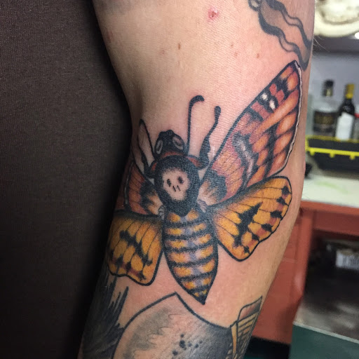 Explore lesbian couple tattoo ideas, creative tattoo ideas in Reno, available at Aces Tattoo