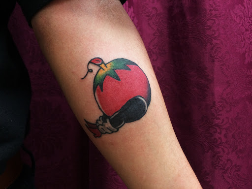 Explore tattoo face ideas, creative tattoo ideas in Corona, available at Crop Circles Tattoo Studio