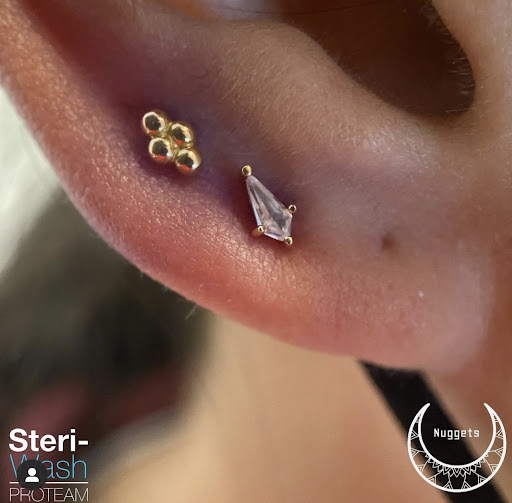 Find jewel tattoo ideas for your next unique tattoo in Edison at Black Moon Piercing