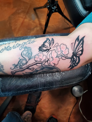 Explore april birth flower tattoo ideas, creative tattoo ideas in Inverness, available at The Perfect Spot Tattoos