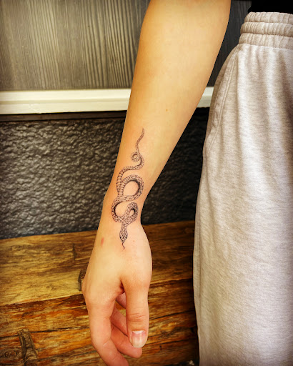 Explore single mom tattoo ideas, creative tattoo ideas in Spokane, available at Ron LeMay Tattoo