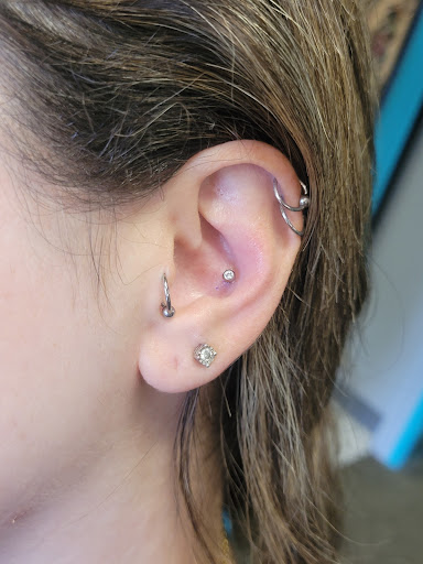 Explore circus tattoo ideas, creative tattoo ideas in Wayne, available at Shotsies Tattoo