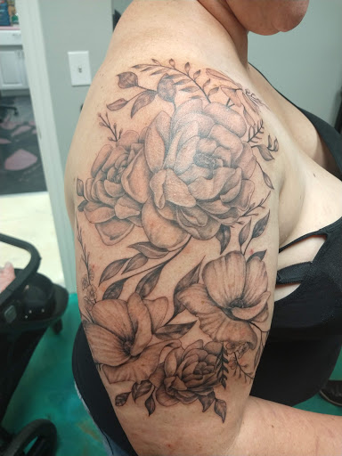 Explore line tattoo ideas for females, creative tattoo ideas in Galveston, available at Von Striga Art Parlor