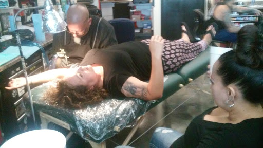 Explore tattoos tramp stamp ideas, creative tattoo ideas in Garden Grove, available at Dr. Tattoo Studio