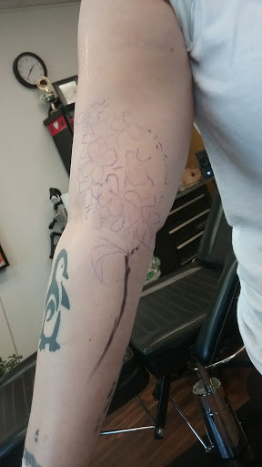 Explore aquarius tattoo ideas male, creative tattoo ideas in Rock Island, available at OTool Design Custom Tattoo