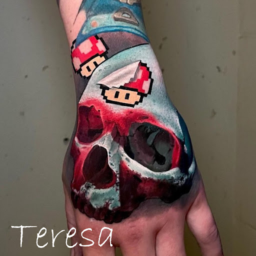 Explore skull and roses tattoo ideas, creative tattoo ideas in Sanford, available at Venom Ink Tattoo