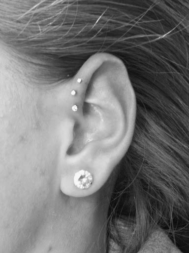 Explore forearm rose tattoo ideas, creative tattoo ideas in Saint Paul, available at Fraidy Cats Professional Body Piercing