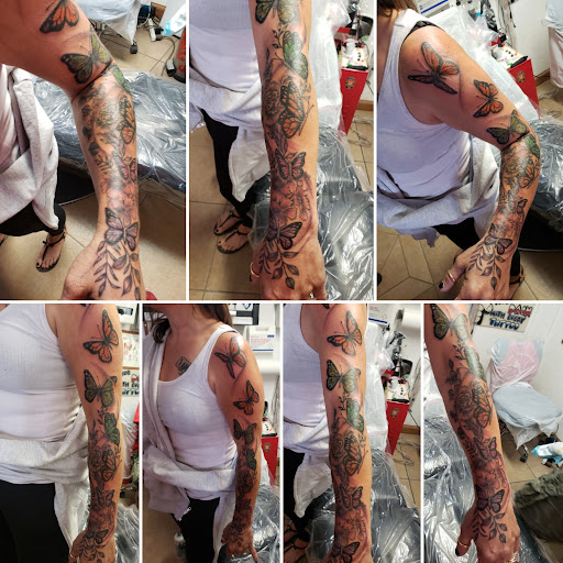 Explore tattoo back ideas, creative tattoo ideas in Elko, available at Custom Tattoos and Body Piercing Studio