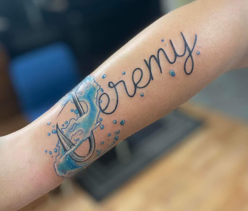 Explore laugh now cry later tattoo ideas, creative tattoo ideas in Benton, available at Spectrum Tattoo