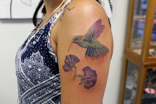 Explore warrior sleeve tattoo ideas, creative tattoo ideas in Fort Myers, available at Tiger Lotus Tattoo and Piercing