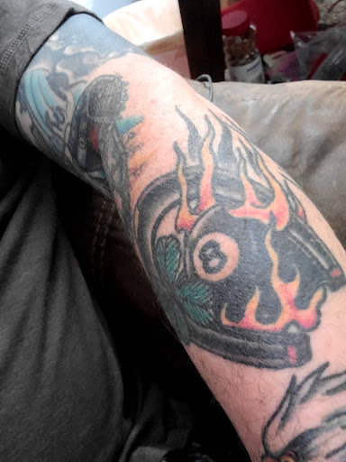 Explore tattoo ideas for the back of the neck, creative tattoo ideas in Muncie, available at Fox & Sparrow Tattoo