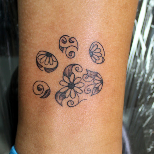 Explore cute bear tattoos ideas, creative tattoo ideas in Fort Myers, available at Tiger Lotus Tattoo and Piercing