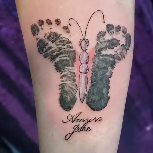 Explore memorial cross tattoo ideas, creative tattoo ideas in Brandenburg, available at Envious Ink Studio