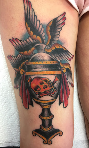 Explore cupid tattoo ideas, creative tattoo ideas in Concord, available at Sterling Tattoo Club