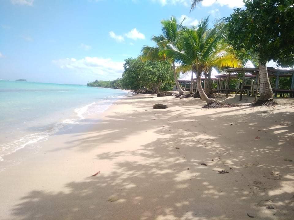 Photo of Tafatafa Beach with turquoise water surface