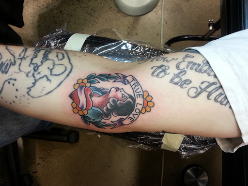 Explore female forearm tattoo ideas, creative tattoo ideas in Egg Harbor Township, available at Mr. Blue Sky Tattoo