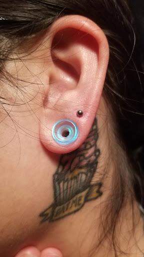 Explore magnolia tattoo ideas, creative tattoo ideas in Brandon, available at Hot Box Tattoos