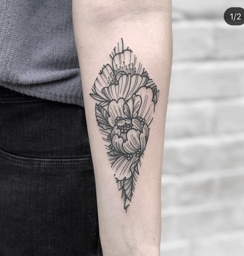 Explore last name tattoo ideas on arm, creative tattoo ideas in Savannah, available at Tramp Art Studios