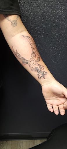 Find daddy tattoo ideas for your next unique tattoo in Pinellas Park at Dark Mark Ink Piercing & Tattoo Studio