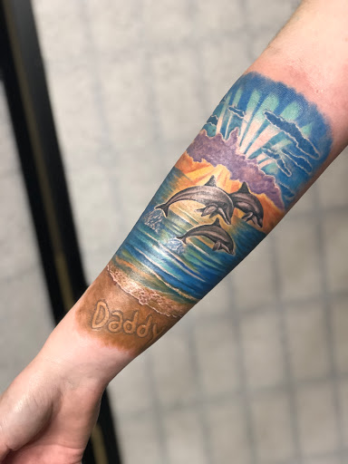 Explore july birth flower tattoo ideas, creative tattoo ideas in Oviedo, available at YTL studios INK