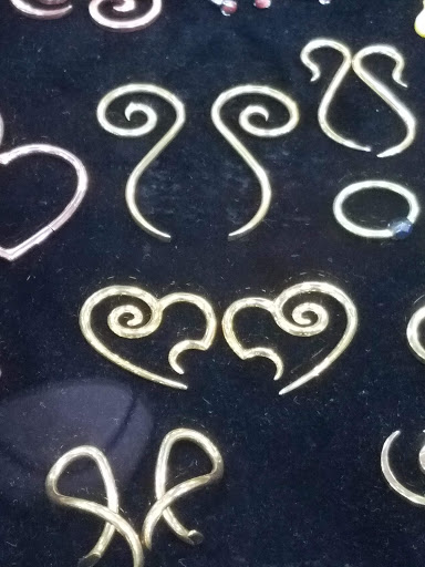 Explore half sleeve tattoo ideas for guys, creative tattoo ideas in Phoenix, available at Halo Piercing and Fine Jewelry