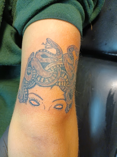 Explore religious tattoo cover up ideas, creative tattoo ideas in Owosso, available at Twisted ink tattoo