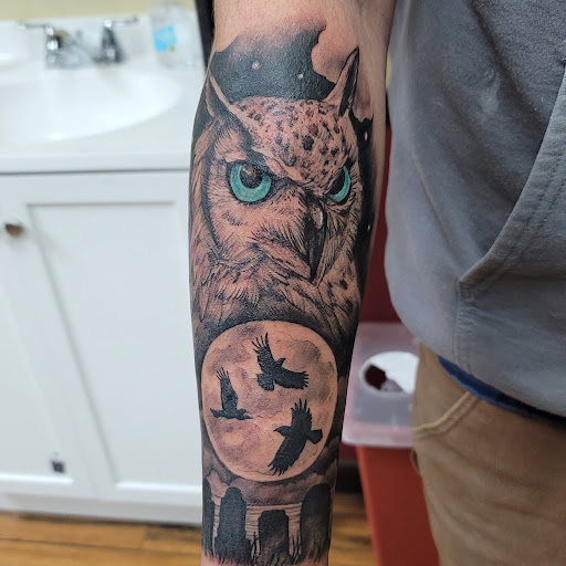 Explore ring tattoo cover up ideas, creative tattoo ideas in Green Bay, available at Skinny Buddha Tattoo