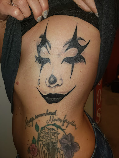 Explore sternum tattoo ideas for females, creative tattoo ideas in Export, available at Patriotic pain tattoo
