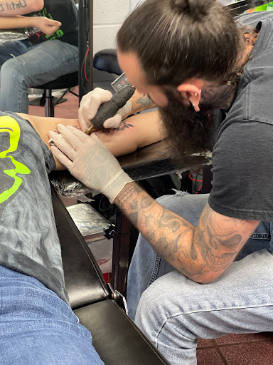 Explore men's arm sleeve tattoo ideas, creative tattoo ideas in Longview, available at Fugis Tattoo Shop