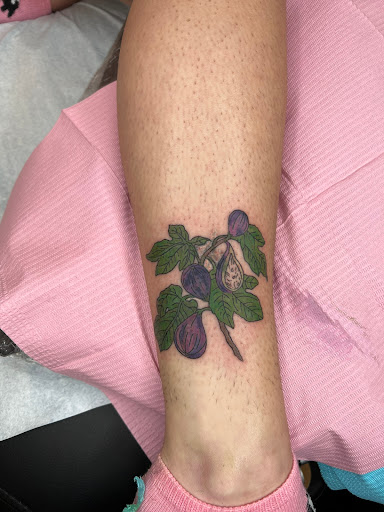 Explore flower tattoo ideas for guys, creative tattoo ideas in Harrisonburg, available at Liberty Street Tattoos