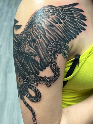 Explore black ink tattoo ideas, creative tattoo ideas in Pittsburg, available at Delta Art & Tattoo