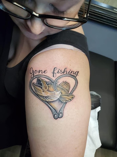 Explore cover up tattoo ideas lower back, creative tattoo ideas in Indianapolis, available at Inkfam Tattoo Gallery