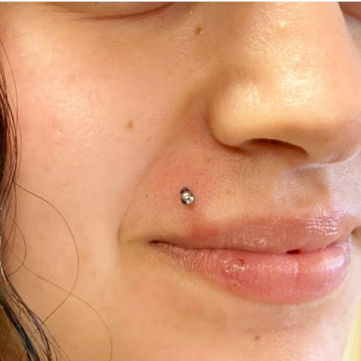 Explore engagement ring tattoo ideas, creative tattoo ideas in Summerville, available at Exotic Impressions Body Piercing