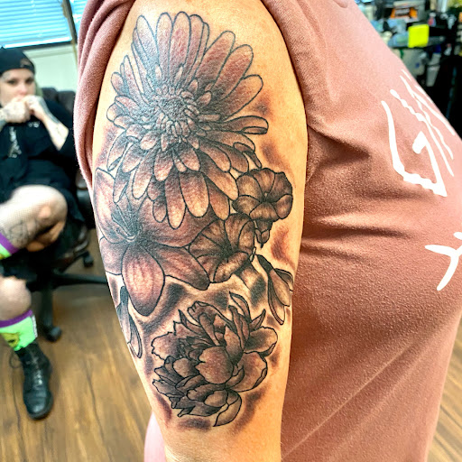 Explore david bowie tattoo ideas, creative tattoo ideas in Pineville, available at Epic Ink Studio