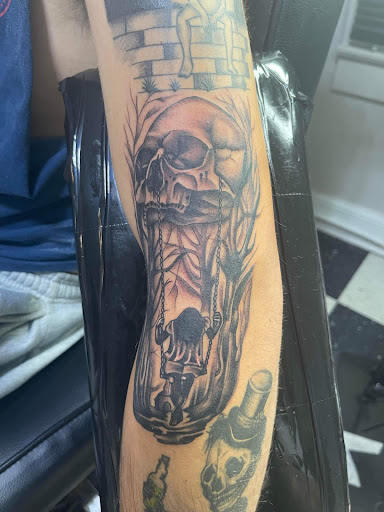 Explore fine line spine tattoo ideas, creative tattoo ideas in Kannapolis, available at Ink Station Tattoo Studio