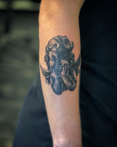 Explore grandfather tattoo ideas, creative tattoo ideas in Milwaukee, available at Planet Artz Tattoo Studio