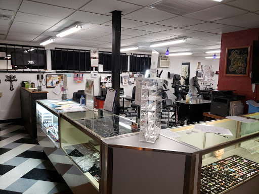 Tattoo Shop «Ink Slingers», reviews and photos, 1355 E Kearney St, Springfield, MO 65803, USA