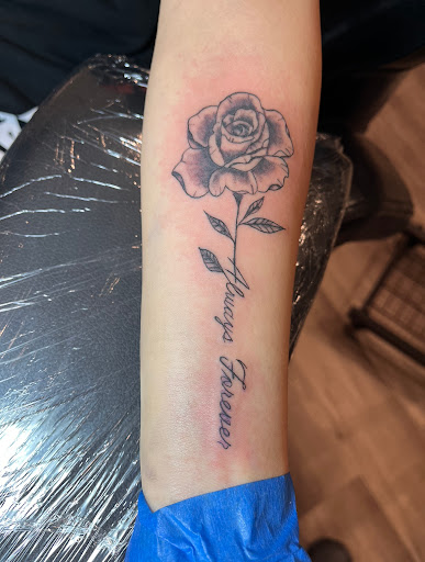 Explore tattoo ideas for female arm, creative tattoo ideas in Slinger, available at Tattoo Therapy By T