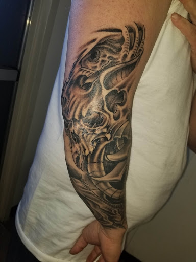 Explore art tattoo ideas, creative tattoo ideas in Watford City, available at The Ink Well Tattoo & Body Piercing