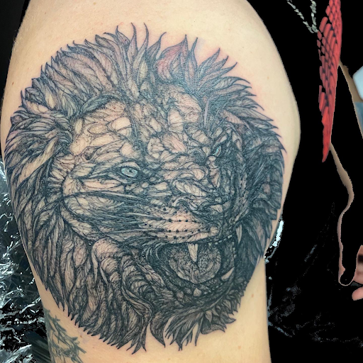 Explore back arm tattoo ideas for guys, creative tattoo ideas in Greenville, available at Deep Liquid Ink