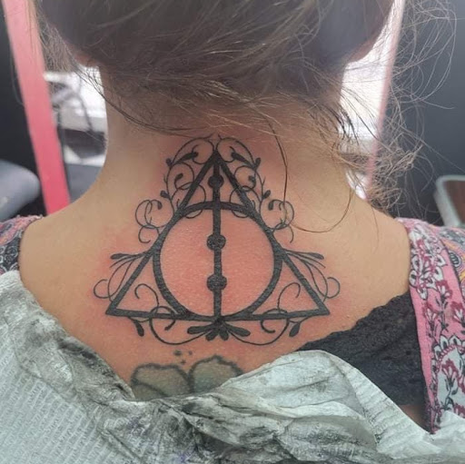 Explore taz tattoo ideas, creative tattoo ideas in Saint Albans, available at Red Dragon Tattoo