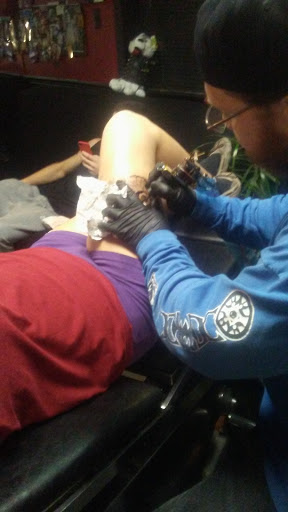 Explore crown tattoo ideas, creative tattoo ideas in Erie, available at EliKingInk