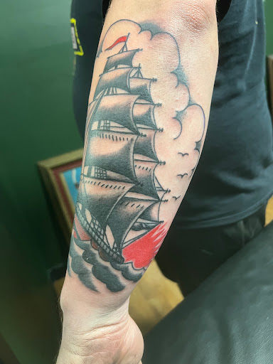 Explore throat tattoo ideas for females, creative tattoo ideas in Fort Worth, available at Randy Adams Tattoo Studio